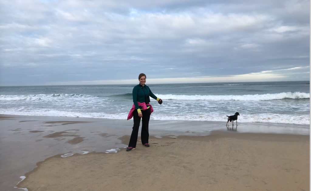 Woman at beach with dog