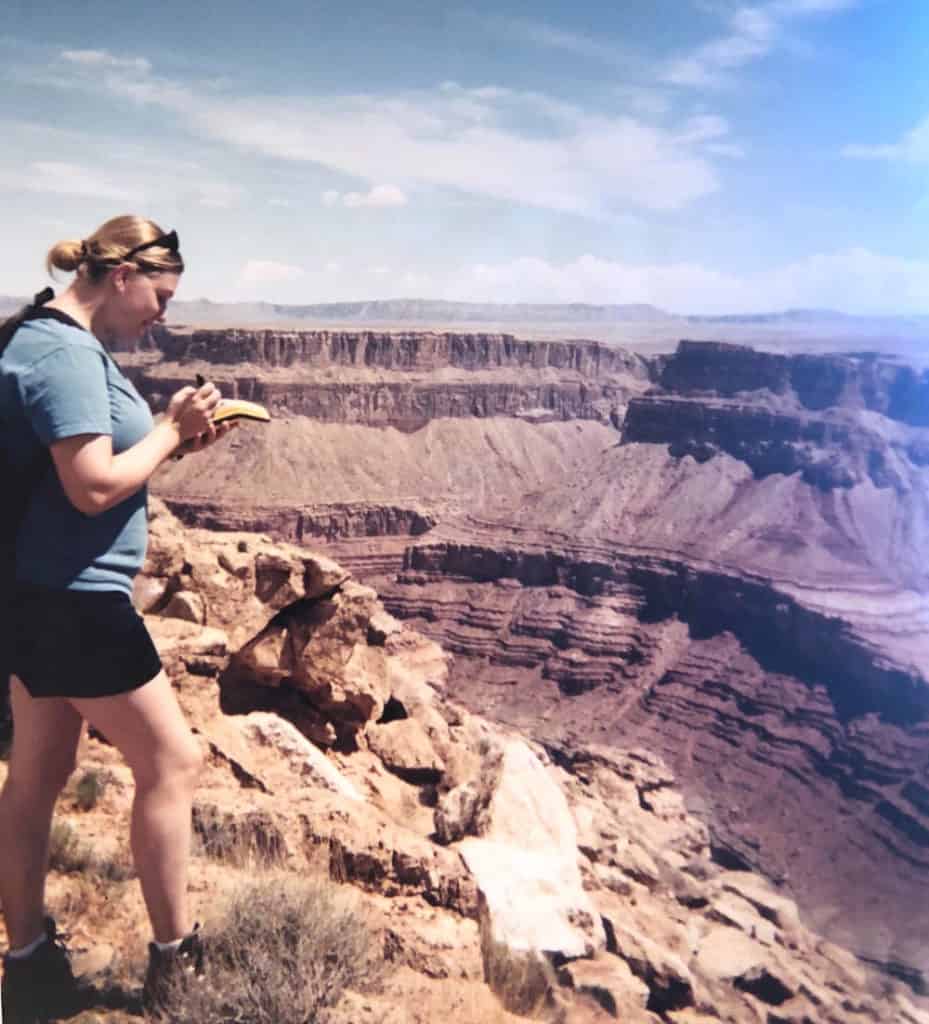 wildlife biologist using a GPS