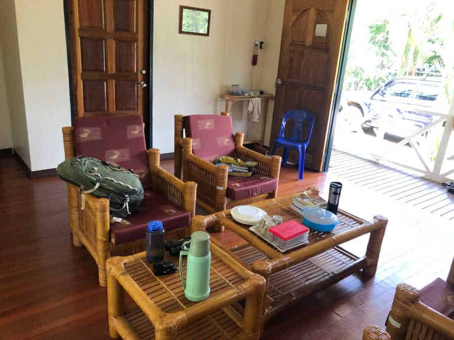 A picture of a living room with bamboo furniture