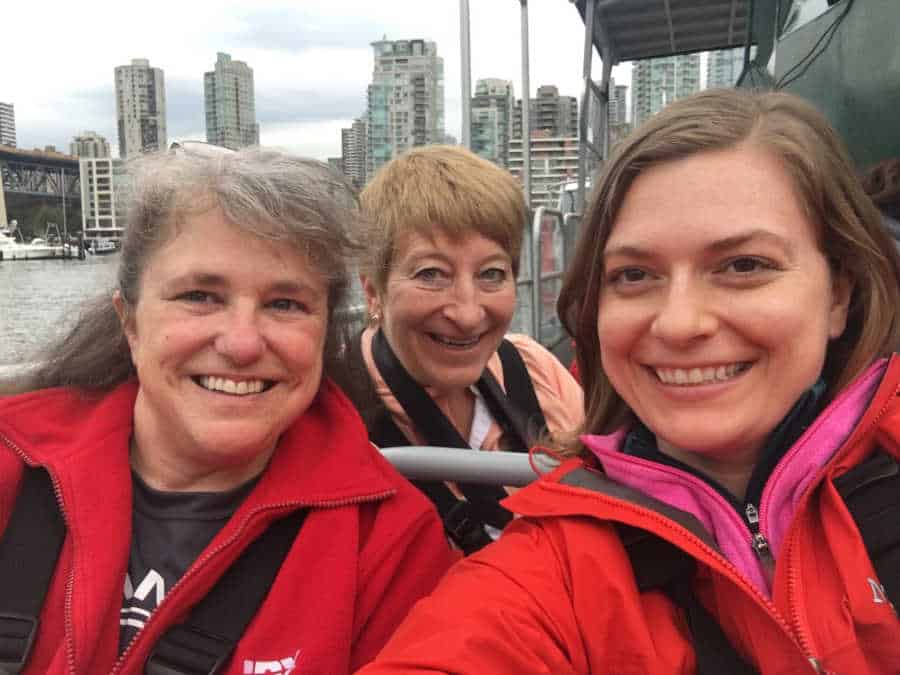 A picture of 3 women taking a selfie.