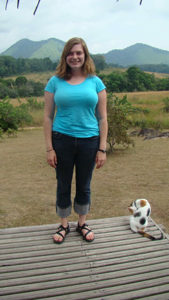 A picture of a woman and a cat