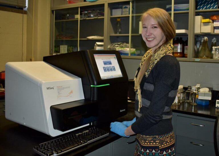 Charlotte Hacker working on her snow leopard genetics research.